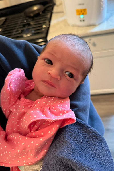 A baby smiling.