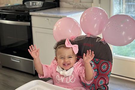A baby smiling.