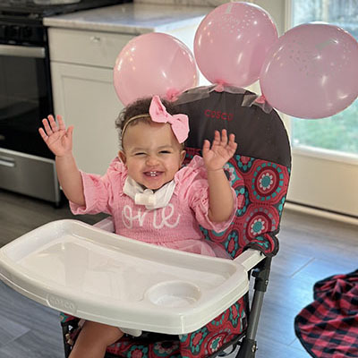 A baby smiling.
