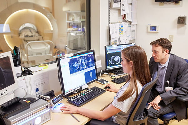 A photo of doctors reading an image.