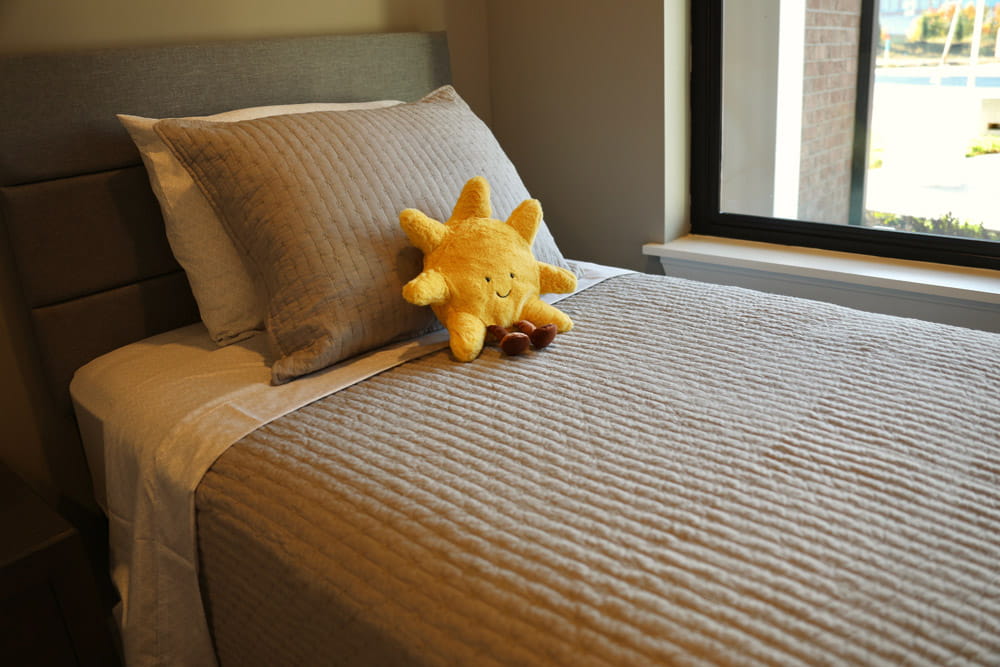 A bed in the Bold and Brave Kid’s Foundation's extended stay apartments.