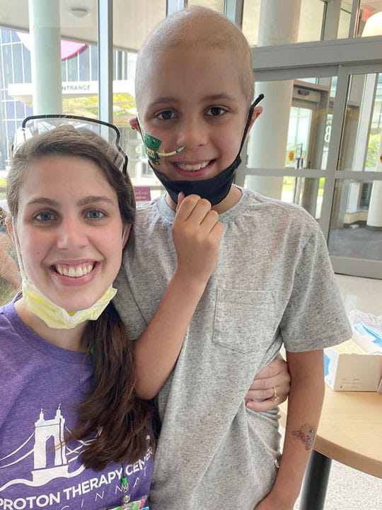 Atticus with child life specialist.