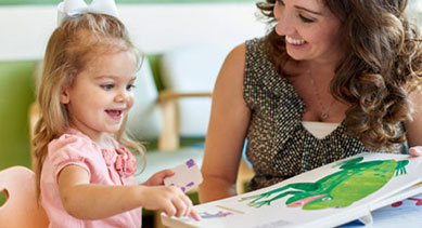 Reading to a child.