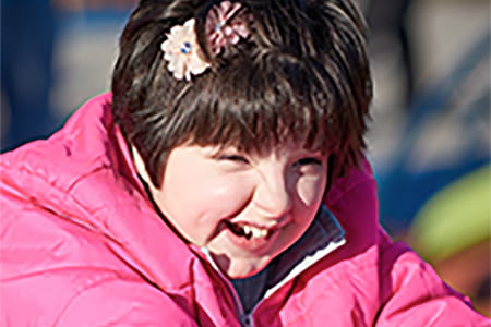 Photo of Mia, an RTS patient.