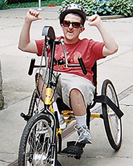 A photo of an RTS patient riding his bike.