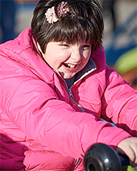 A photo of an RTS patient smiling.
