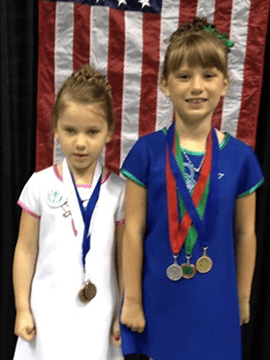 Erin and Cate smile.