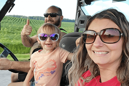 Taya and her parents.