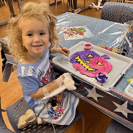 Harper enjoyed painting while at Cincinnati Children's.