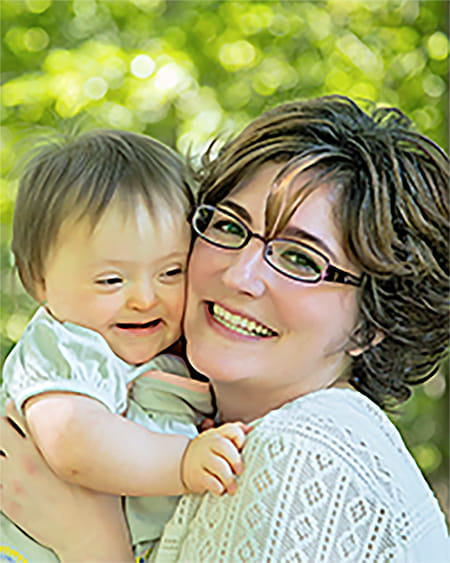 An image of a mother and her daughter.