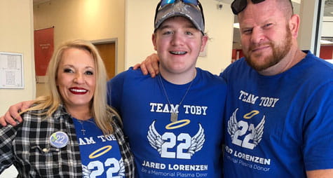 Toby and his parents.