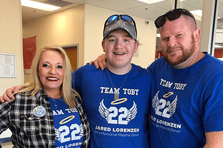 Toby and his parents.