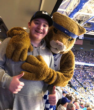 Toby with UK wildcat mascot.