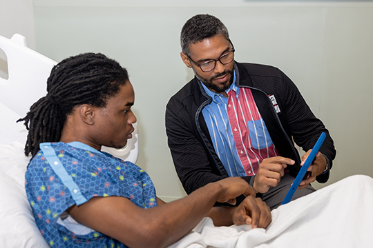 Talking with a patient.