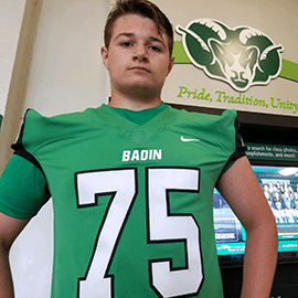 Max in football uniform.