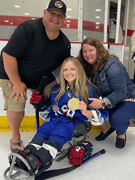 Jamie with her parents.
