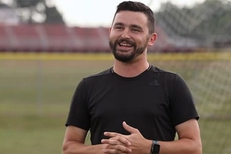 Cancer survivor talking to the camera.