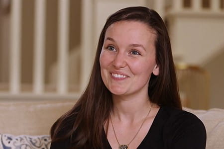 Cancer survivor talking to the camera.