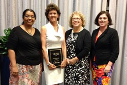 Faculty members with honoree Buffie Rixey.
